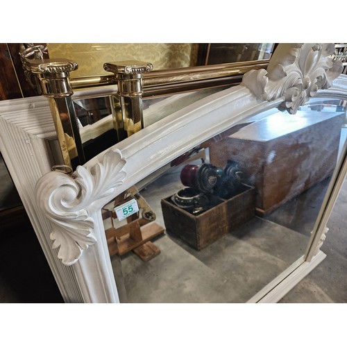 55 - Large white painted overmantel mirror. With scalloped top