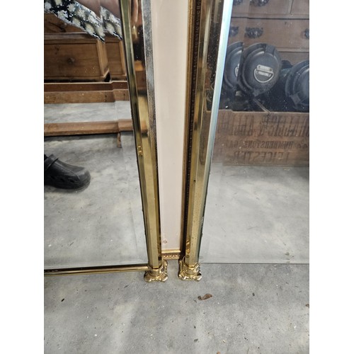 56 - Pair of brass and beveled edge wall hanging mirrors. With fancy decoration