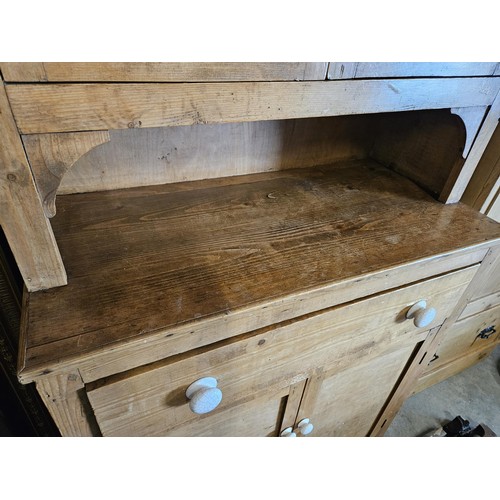 59 - Waxed pine small Welsh dresser with white porcelain handles

90cm wide x 43cm deep x 180cm high