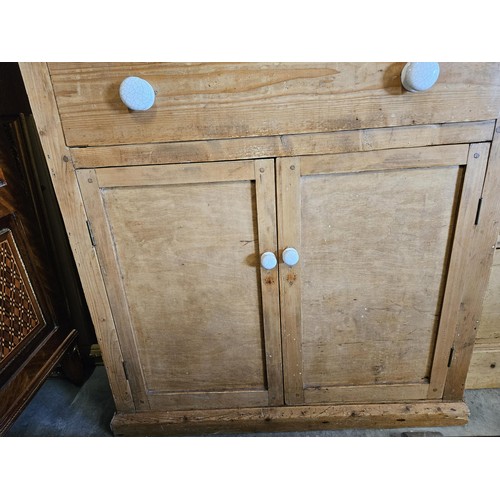 59 - Waxed pine small Welsh dresser with white porcelain handles

90cm wide x 43cm deep x 180cm high