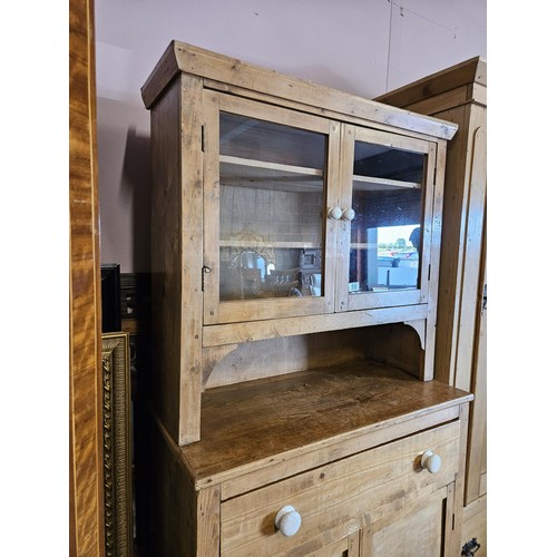 59 - Waxed pine small Welsh dresser with white porcelain handles

90cm wide x 43cm deep x 180cm high