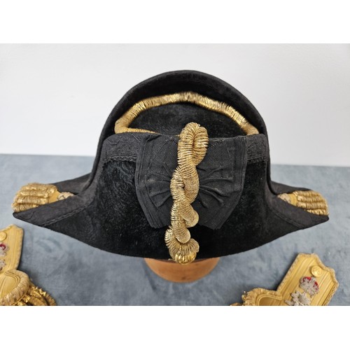 171 - Admiral F.R Parham 
An Edwardian full dress Royal Navy bicorn cocked hat, pair of epaulettes and swo... 