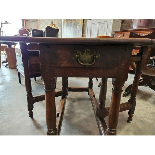 15 - Antique oak drop leaf table