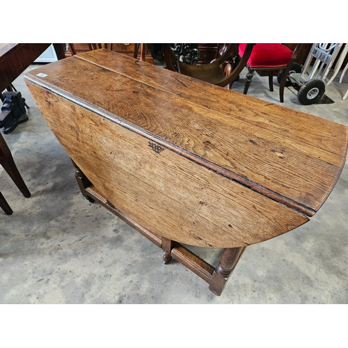 15 - Antique oak drop leaf table