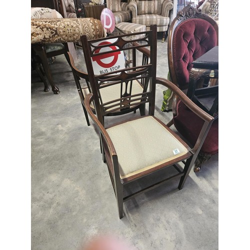 37 - Pair of similar Edwardian armchairs. Both have fine inlay work. Both with the same upholstery