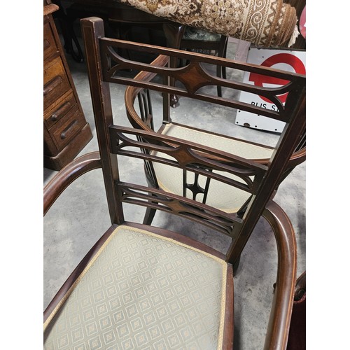 37 - Pair of similar Edwardian armchairs. Both have fine inlay work. Both with the same upholstery