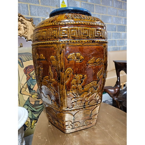 44 - Very large ceramic pot. Oriental - decorated with dragons and dogs.