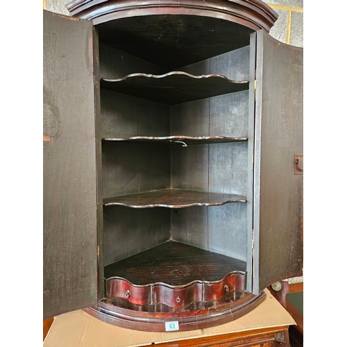 63 - Antique mahogany Georgian corner cupboard with H hinges and scalloped shelves.