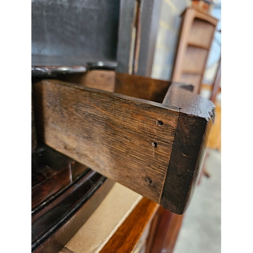 63 - Antique mahogany Georgian corner cupboard with H hinges and scalloped shelves.