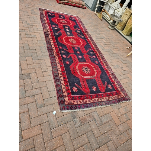 119 - Large antique Aztec design rug

135cm x 336cm