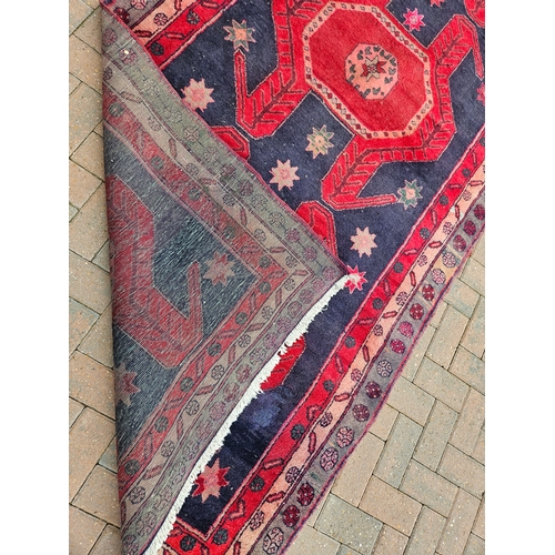 119 - Large antique Aztec design rug

135cm x 336cm