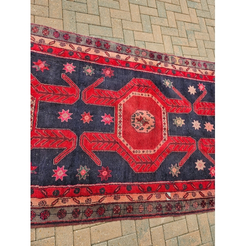 119 - Large antique Aztec design rug

135cm x 336cm