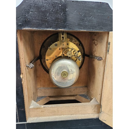 174 - Burr veneer mantel clock, with enamel face and beveled glass.
With pendulum