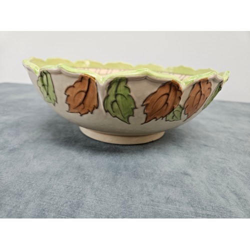 229 - Crown Ducal bowl decorated with leaves 

10cm high x 25.5cm wide