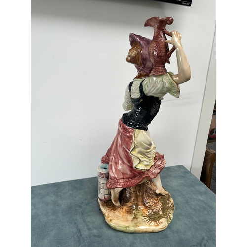 247 - Large Capodimonte ornament of lady 

Chipping to flower 

67cm high x 32cm wide