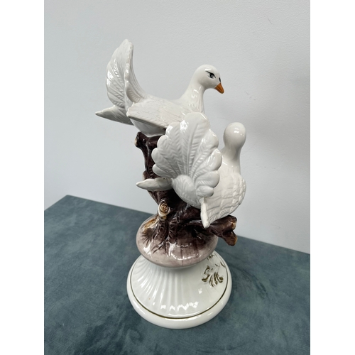 248 - Large Capodimonte ornament of two birds on branch 

45cm high x 29cm wide