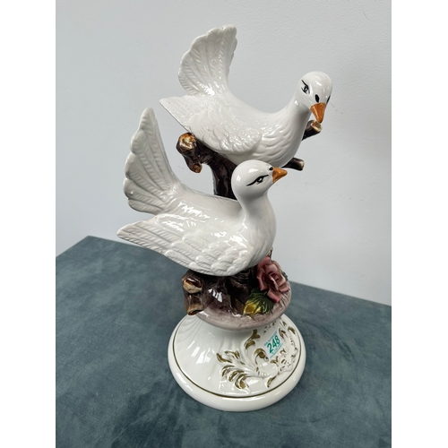 248 - Large Capodimonte ornament of two birds on branch 

45cm high x 29cm wide