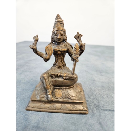 277 - Bronze figure of goddess Dhana Lakshmi 
Hindu goddess of wealth, fortune and prosperity.

12cm high ... 