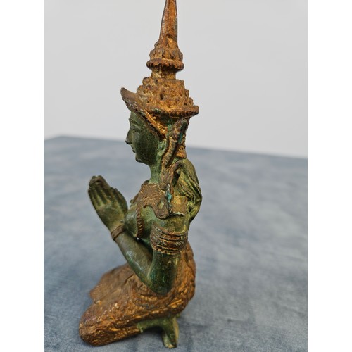 279 - Bronze Thai kneeling temple guardian - Thepanom 
Bronzed and gilt 

17.5cm high x 7cm across base