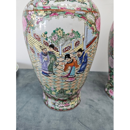 304 - Large pair oriental Famille Rose style vases