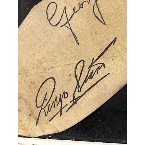 324 - The Beatles signature, George Harrison, John Lennon, Ringo Starr & Paul McCartney.
Unsure on authent... 