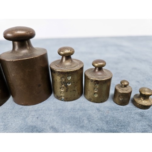 386 - Vintage French set of 7 scale weights. With weights and measures stamp marks