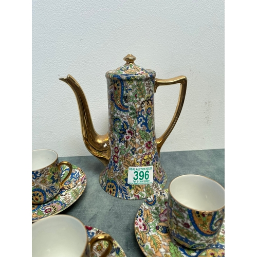 396 - Tea set with teapot, six cups and saucers and sugar bowl