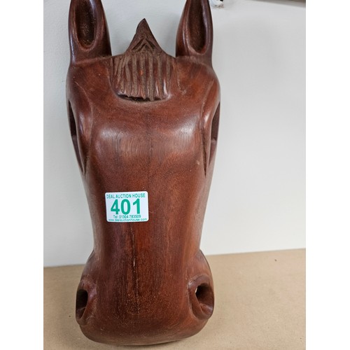 401 - Large wooden carved horse mask

38cm high x 17.5cm wide