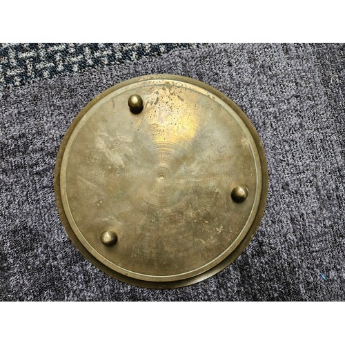 490 - Vintage brass plate with tribal etched figure on it.