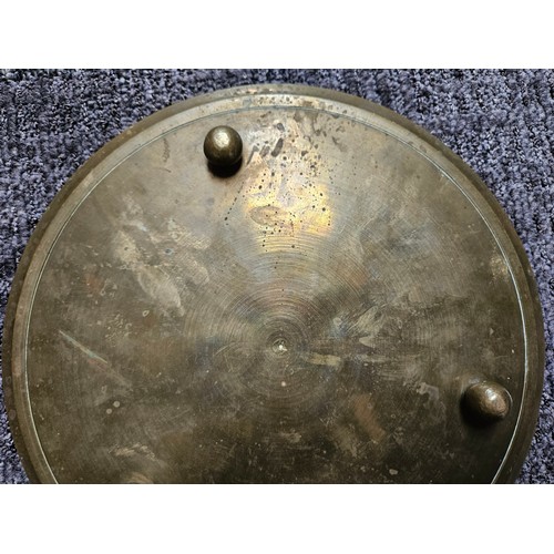 490 - Vintage brass plate with tribal etched figure on it.