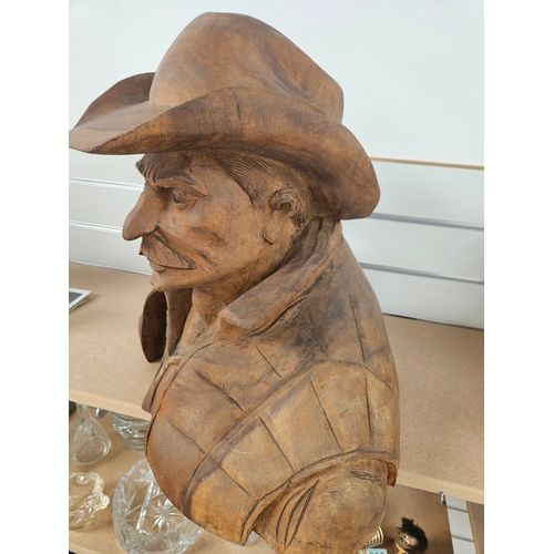 516 - Large Lifesize wooden carved model of a cowboy.
Very heavy