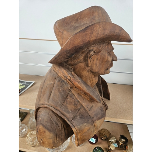 516 - Large Lifesize wooden carved model of a cowboy.
Very heavy