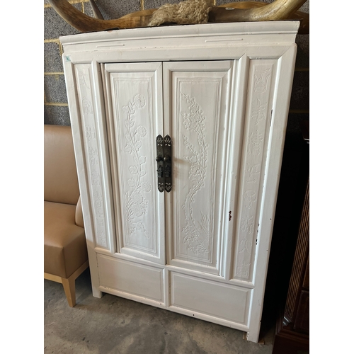 69 - Large oriental white painted wedding type cupboard