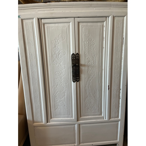 69 - Large oriental white painted wedding type cupboard