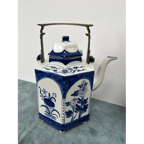 538 - Pair of large oriental blue and white teapots