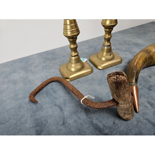 556 - 2 x Brass candlesticks, horn with copper banding + a dockers hook