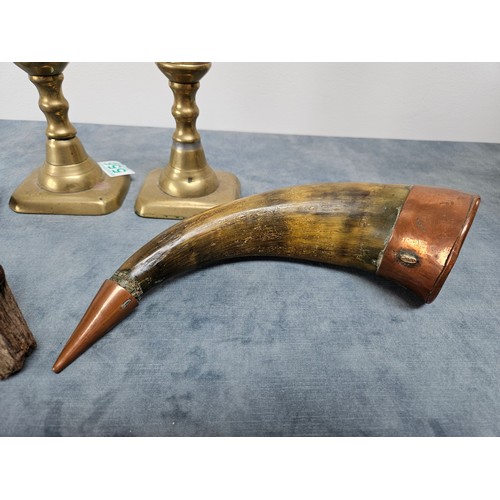 556 - 2 x Brass candlesticks, horn with copper banding + a dockers hook