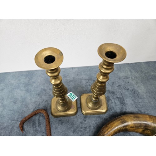 556 - 2 x Brass candlesticks, horn with copper banding + a dockers hook