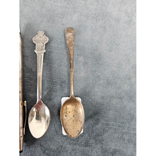 581E - 2 x Spoons
One marked Rolex. 
1 x possibly silver 