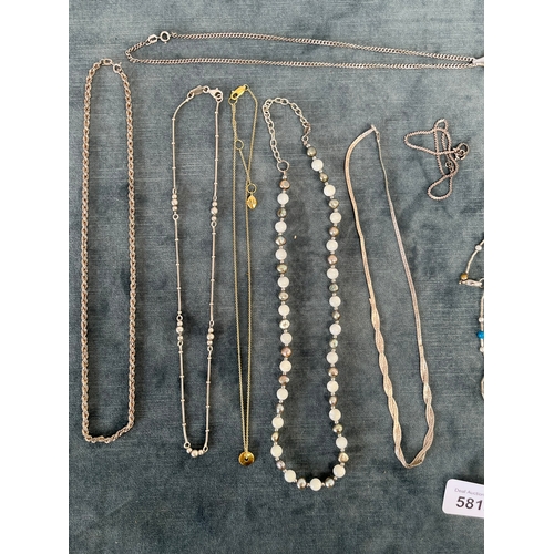 581N - 9 x various silver necklaces