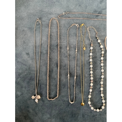 581N - 9 x various silver necklaces