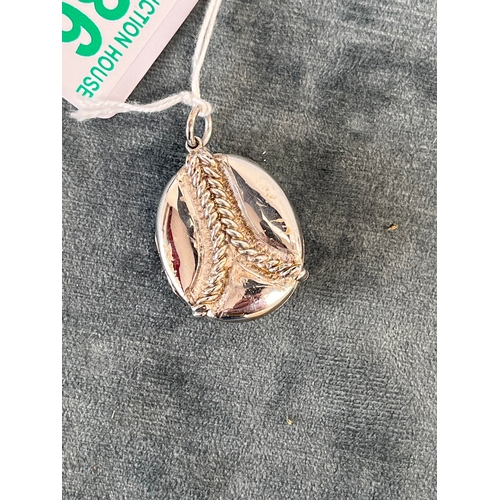 586 - Silver locket pendant