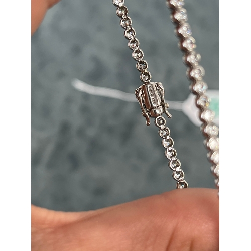 592 - Silver and cz tennis/ line bracelet