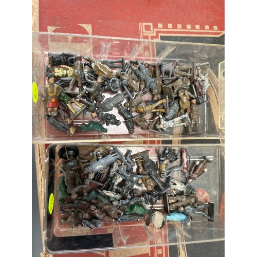 629 - Two small boxes of toy soldiers