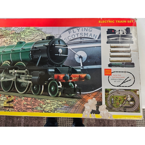 1001 - Hornby boxed Flying Scotsman 
OO gauge model train

Like new never used.