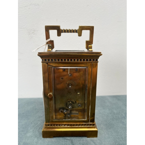 173 - Brass and enamel faced carriage clock. With key 

Not working