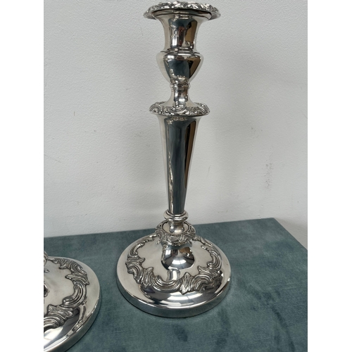 180 - Pair of good quality antique silver plated candle sticks