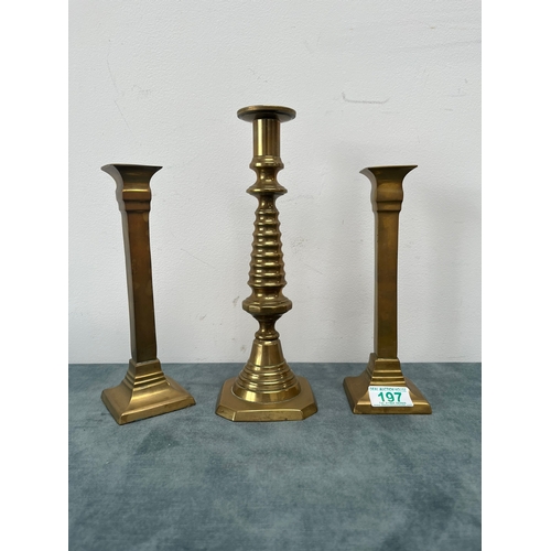 197 - 3 x Brass candlesticks