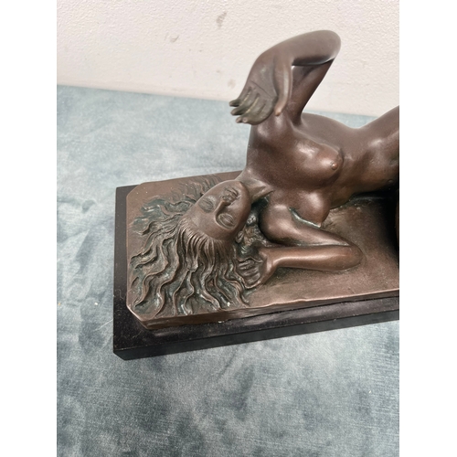 214 - Modern bronze of a reclining nude lady