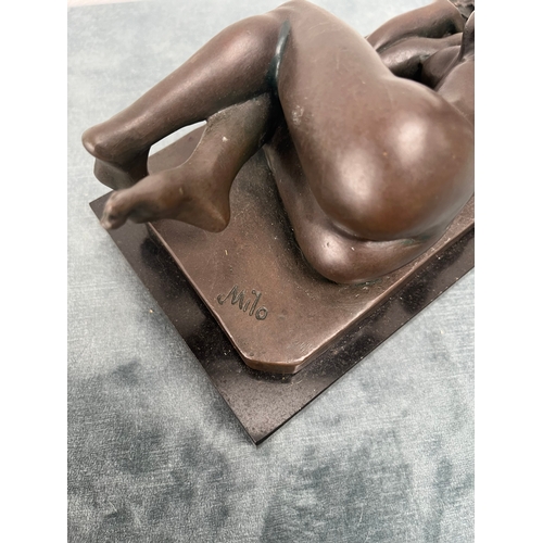 214 - Modern bronze of a reclining nude lady